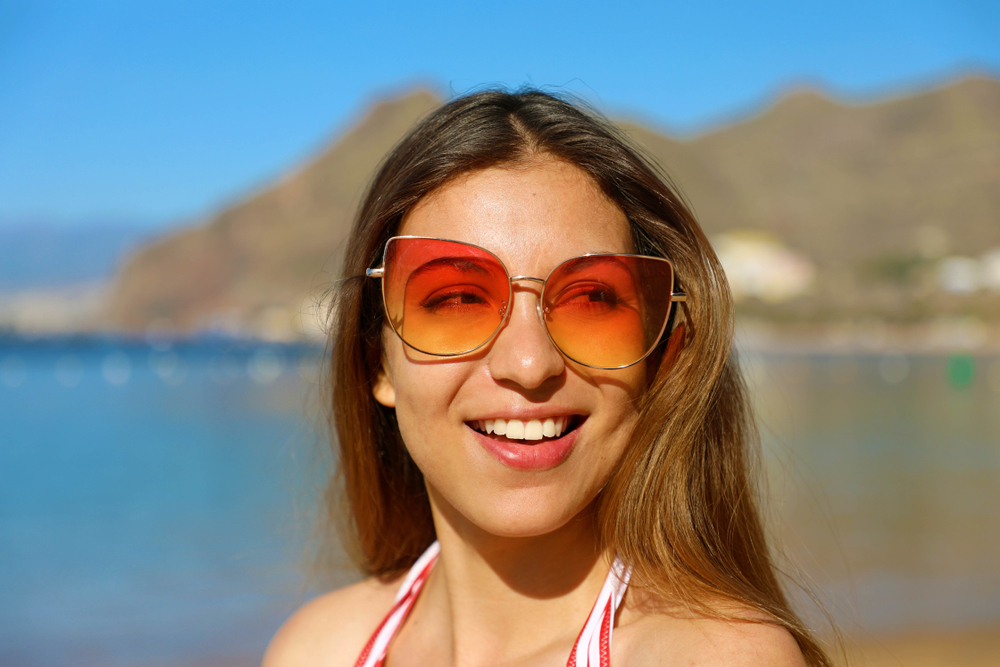 girl-on-beach-with-sunglasses.jpg