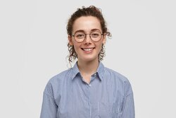 lovely-satisfied-freckled-female-with-crisp-hair-has-gentle-smile-dressed-striped-black-white-shirt-rejoices-positive-moments-life-isol.jpg