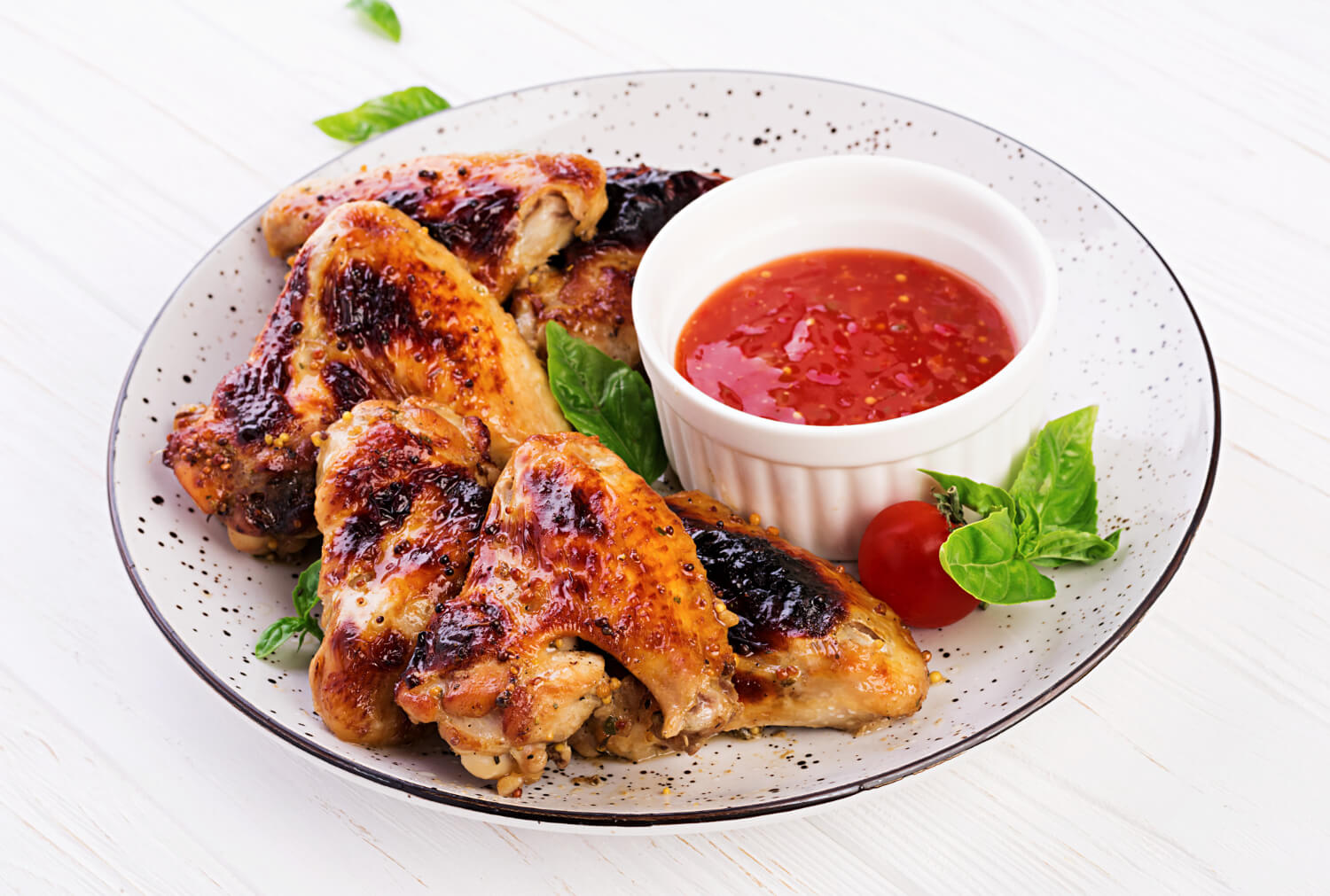 baked-chicken-wings-asian-style-tomatoes-sauce-plate.jpg